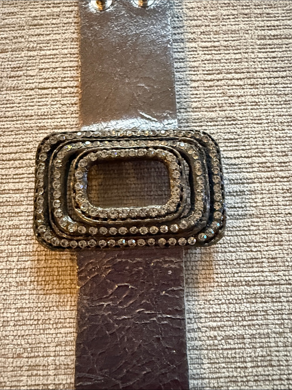 Metallic Silver Leather Statement Bracelet with Decorative Rhinestone Buckle